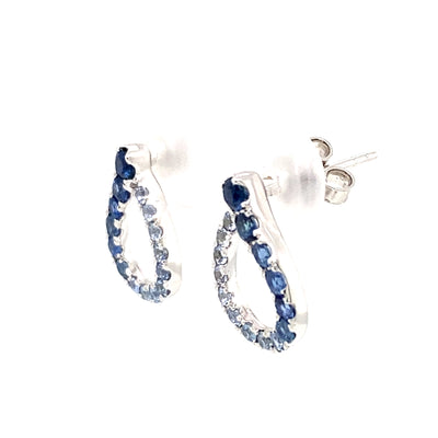 Graduating Blue Sapphire Earrings in White Gold by Parle