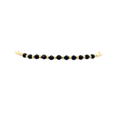 2mm Black Spinel and Gold Pattern Stretch Bracelet in Yellow Gold by Karen Lazar