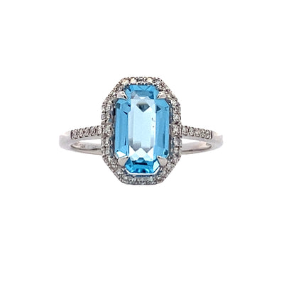 Blue Topaz and Diamond Halo Style Ring in White Gold