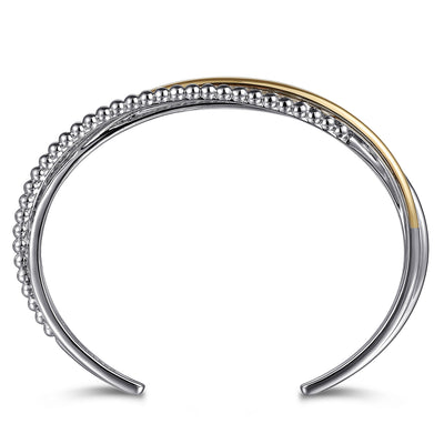 Twisted Bujukan Bangle in Two-Tone Gold by Gabriel & Co.